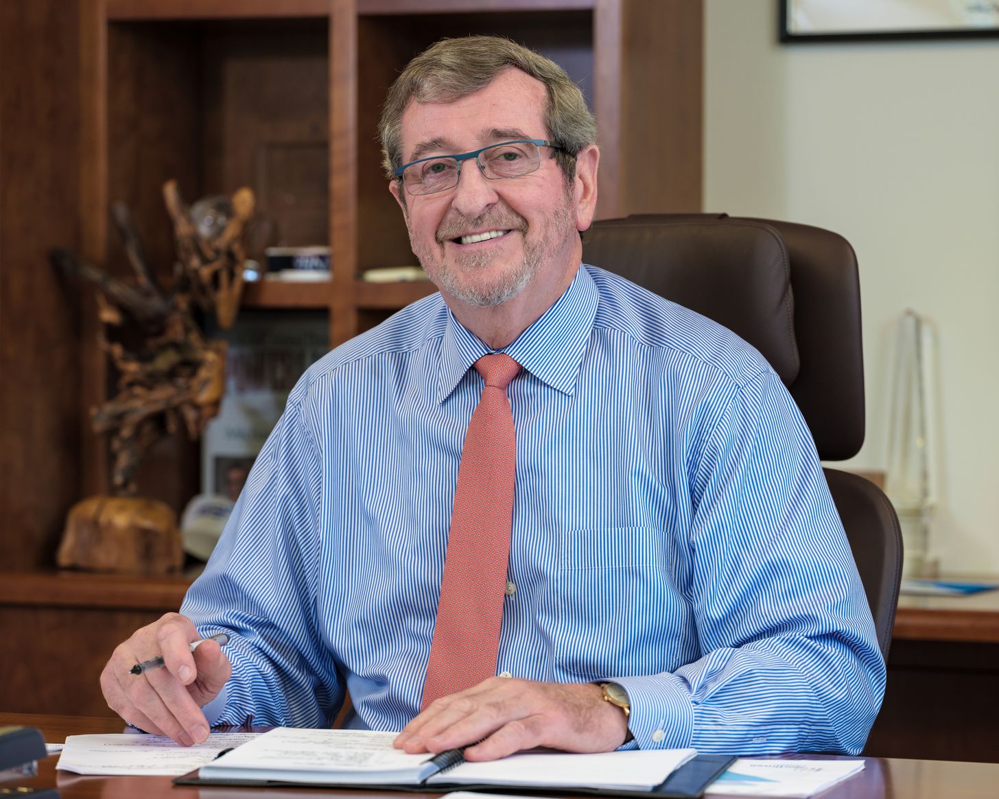 Michael Dowling sitting in his office at Northwell Health headquarters